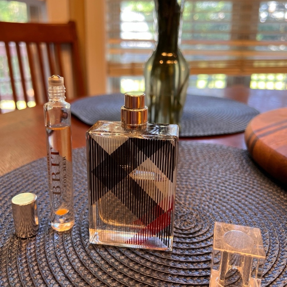 Burberry Brit for her spray bottle and travel